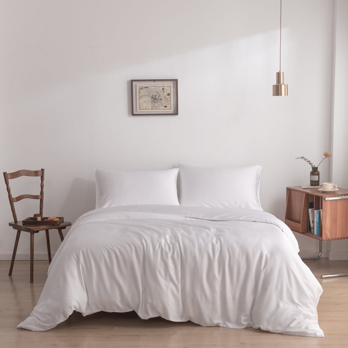 Coco White bamboo bedding set styled on a made bed
