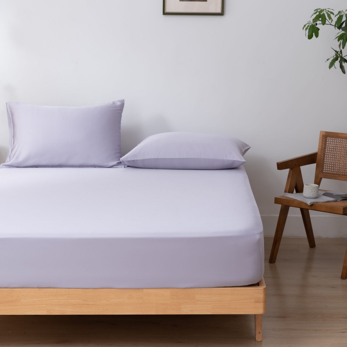 Lavender Mist bamboo bedding set on a wood-framed bed