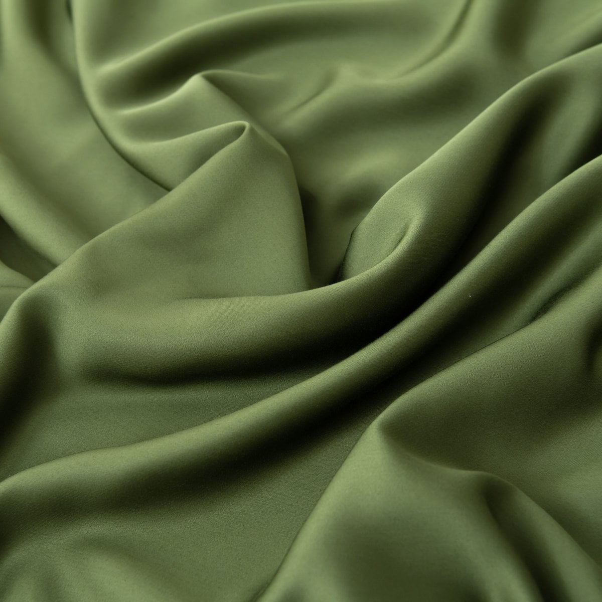 Close-up of the silky, folded 400TC bamboo fabric in Deep Moss showing its smooth sheen