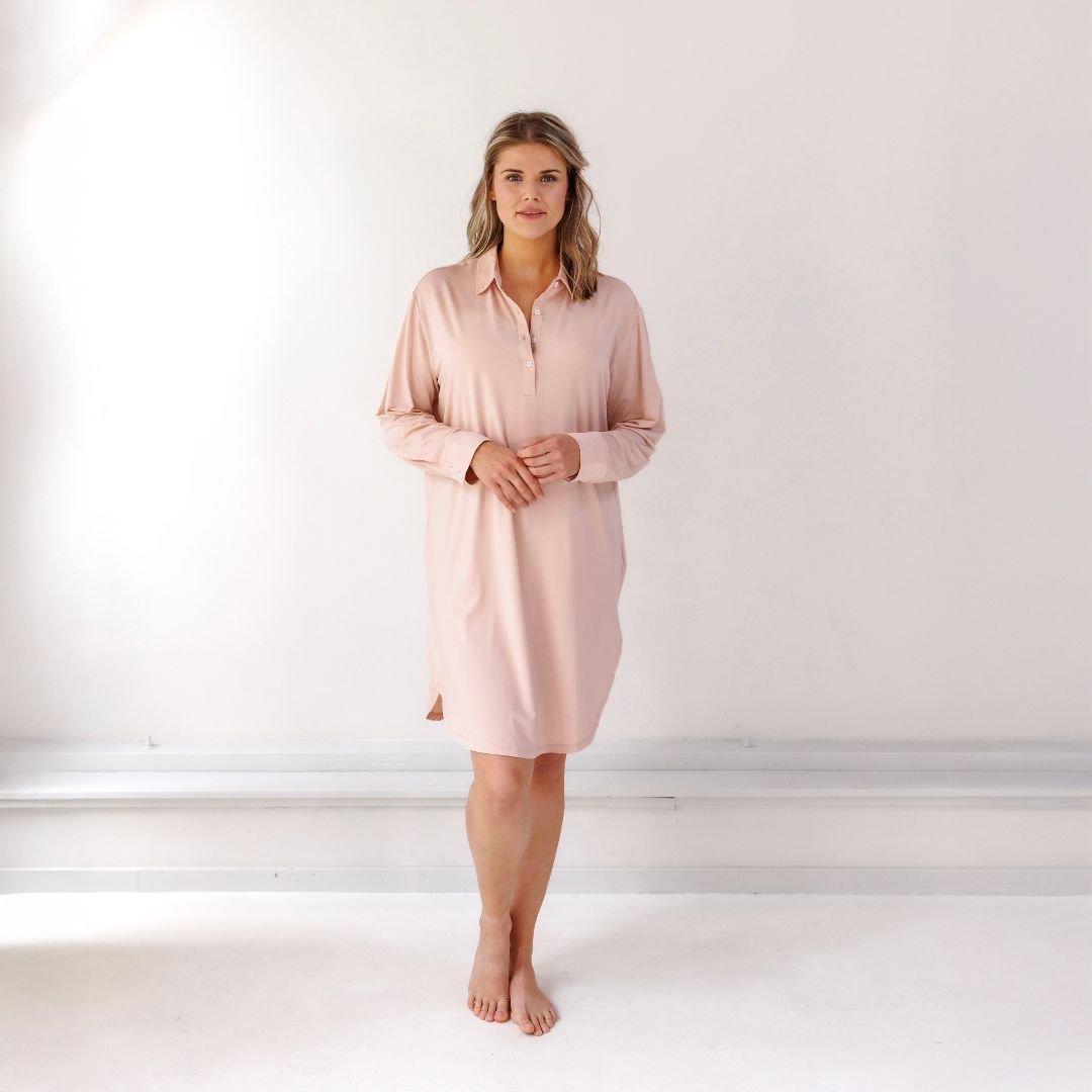 Woman standing in the Powder Peach boyfriend nightgown with a collar and long sleeves