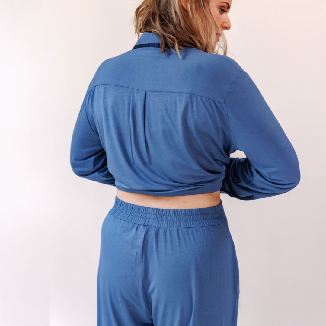 Close-up of the back of the Dark Blue pyjama shirt and the elastic waistband of the trousers