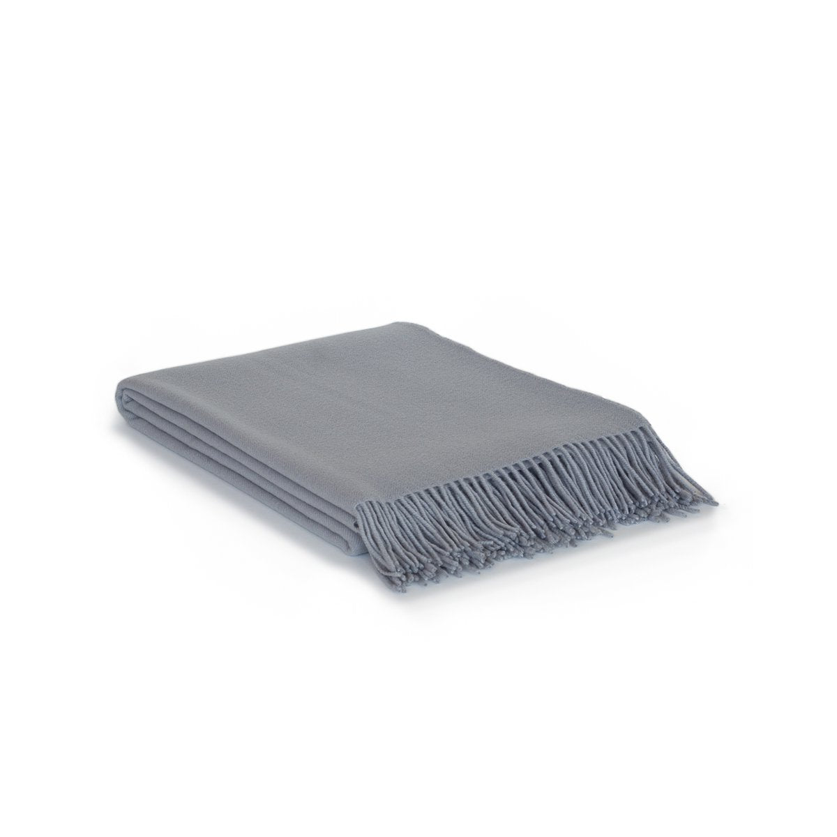 Rio throw blanket in grey, folded with a fringed end, 140×200 cm