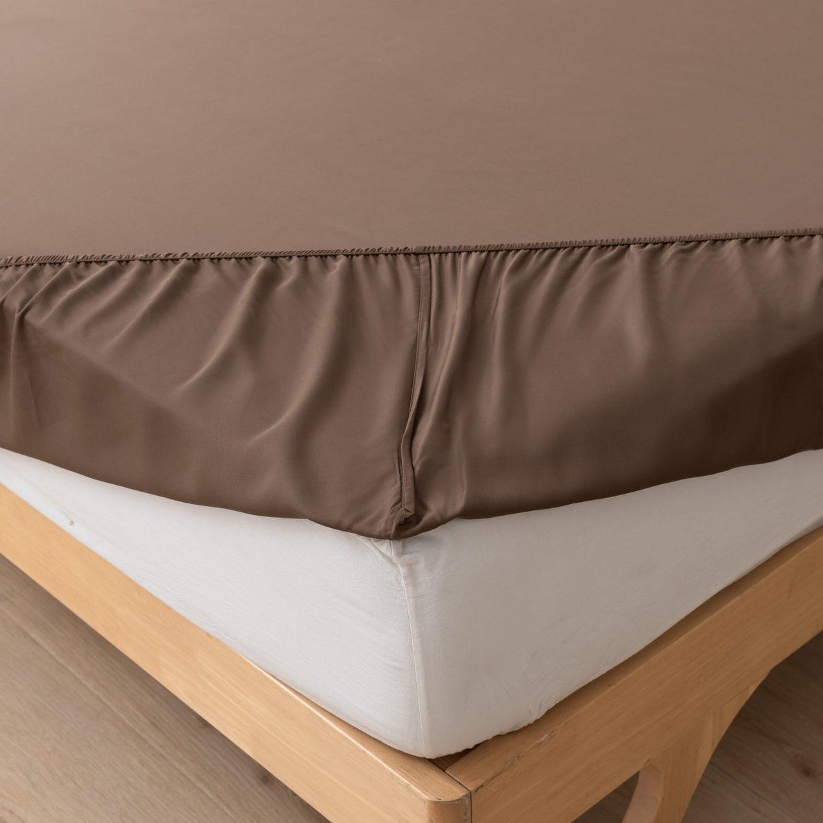 Coffee Brown bamboo fitted sheet showing its elasticated corner