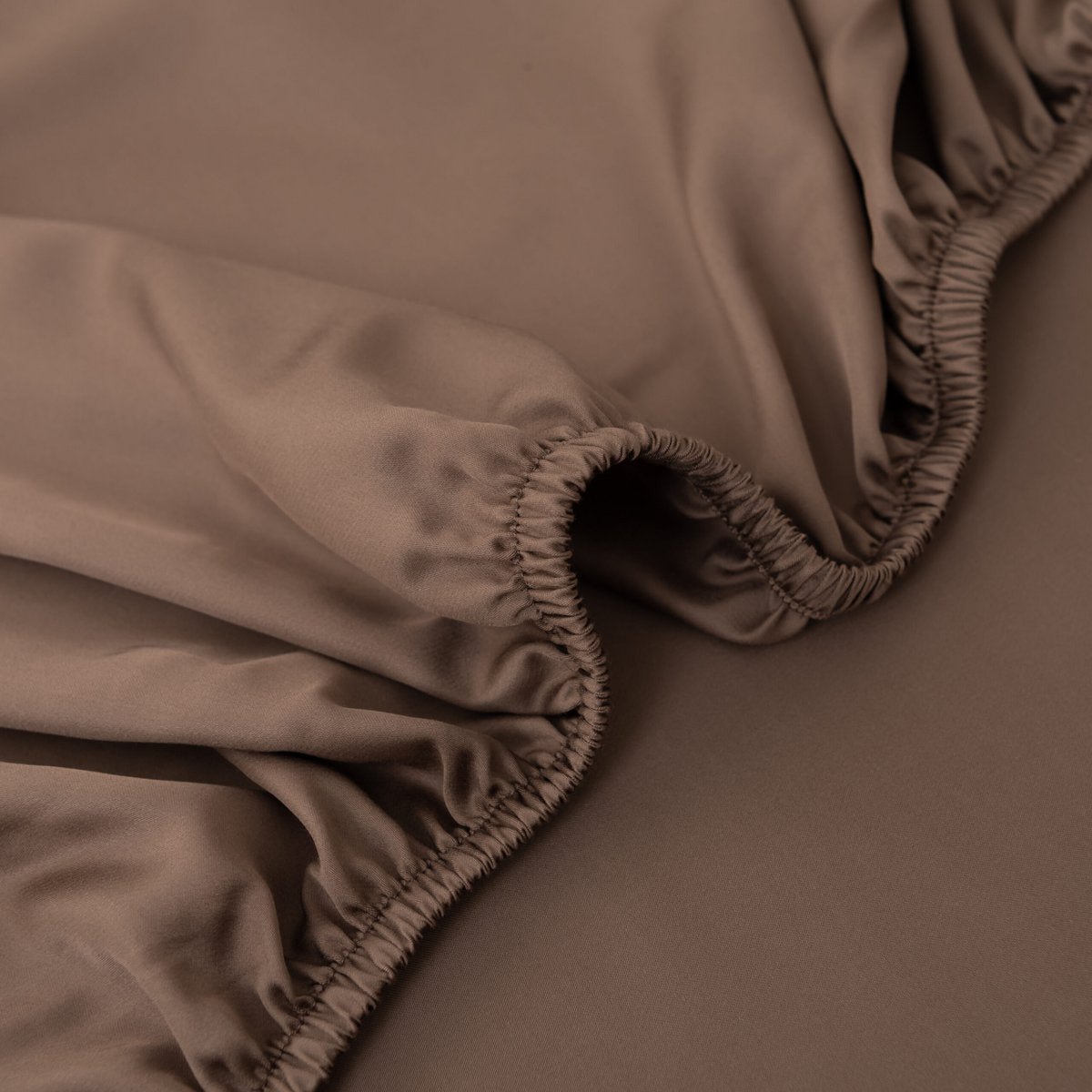 Folded stack of Coffee Brown bamboo bed linen