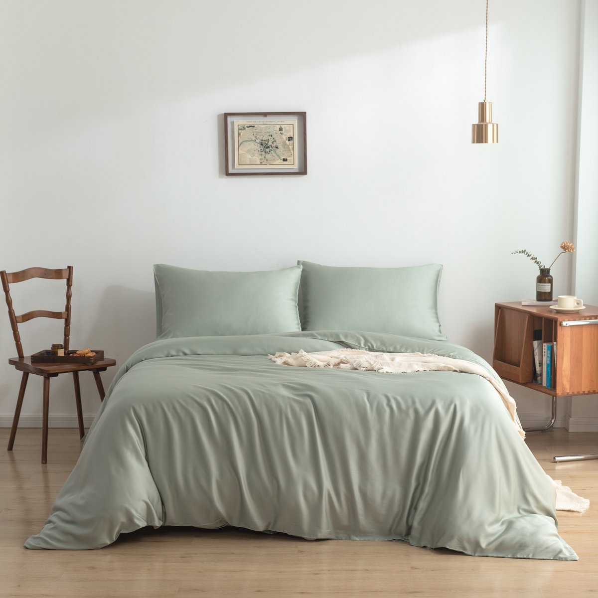 Sage Green bamboo bedding set on a wood-framed bed