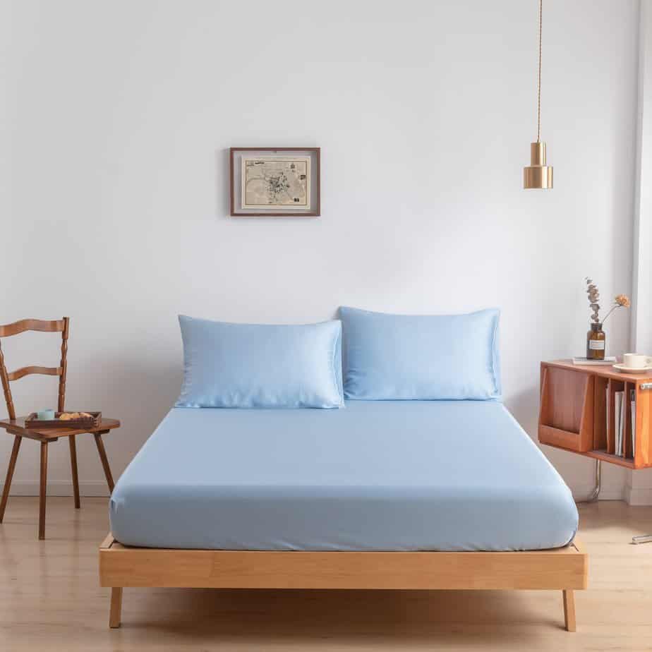 Sky Blue bamboo bedding set on a fully made bed