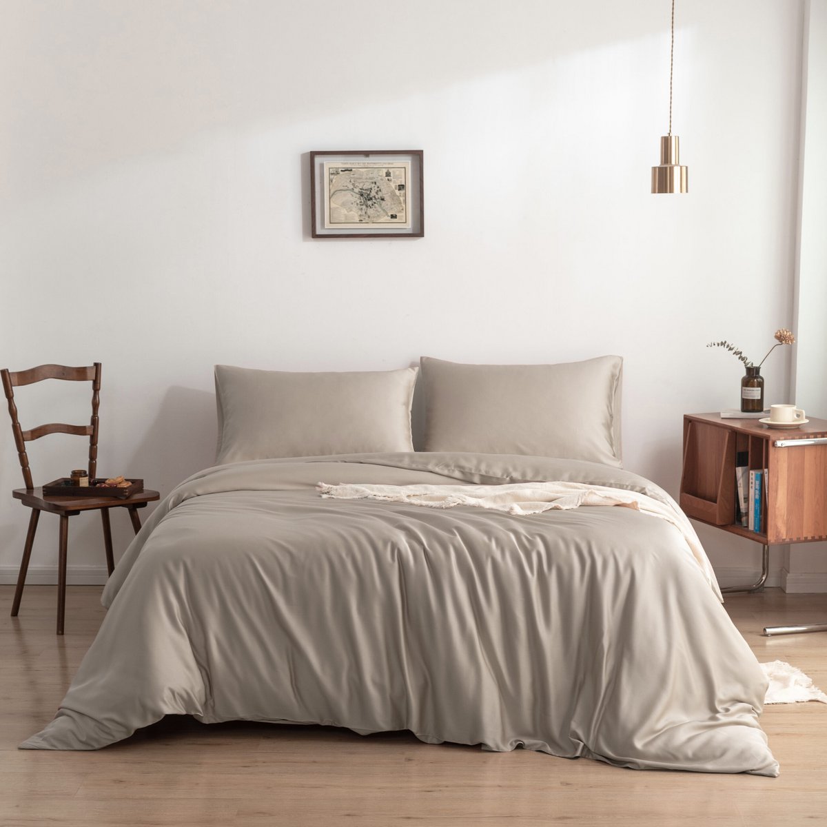 Soft Taupe bamboo bedding set on a made bed