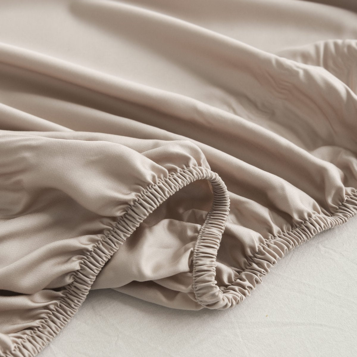 Draped Soft Taupe bamboo fabric showing its soft, silky finish