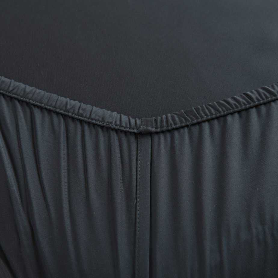 Space Blue bamboo fitted sheet showing its elasticated corner