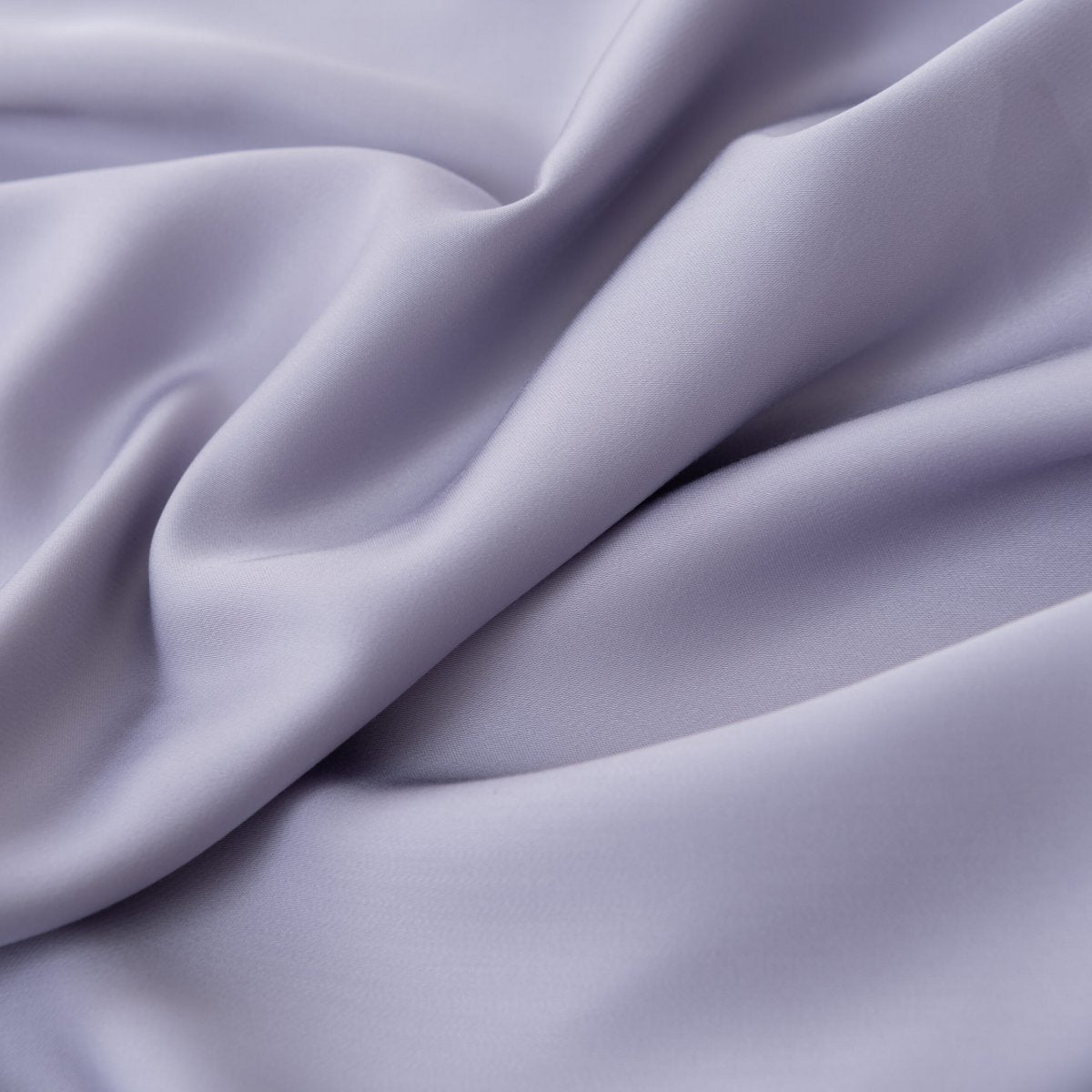 Close-up of draped Lavender Mist bamboo fabric highlighting its soft sheen.