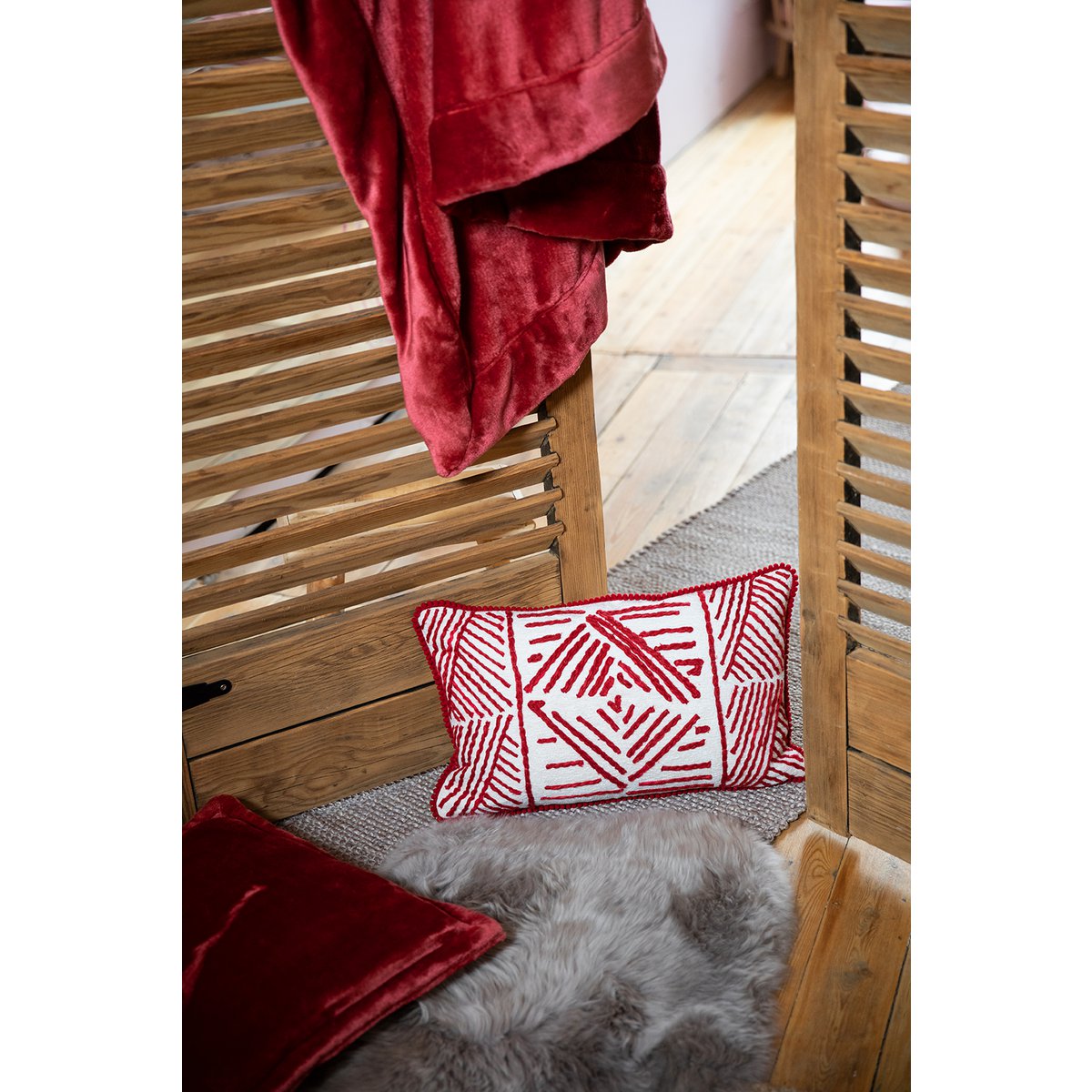 Tender polyester microfibre cushion in ruby, 50×50 cm
