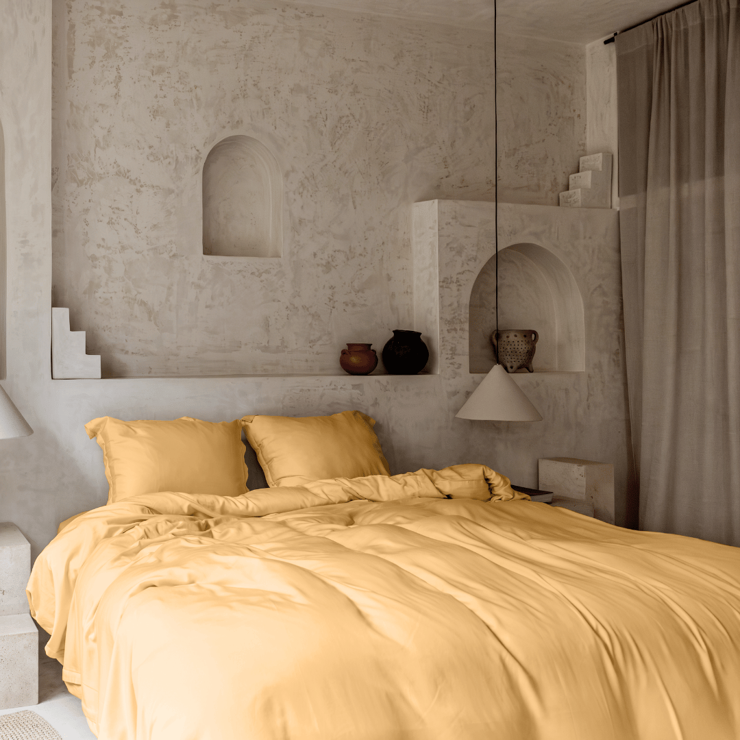 Tencel™ Twill Duvet Cover in Ocher Yellow styled on a bed