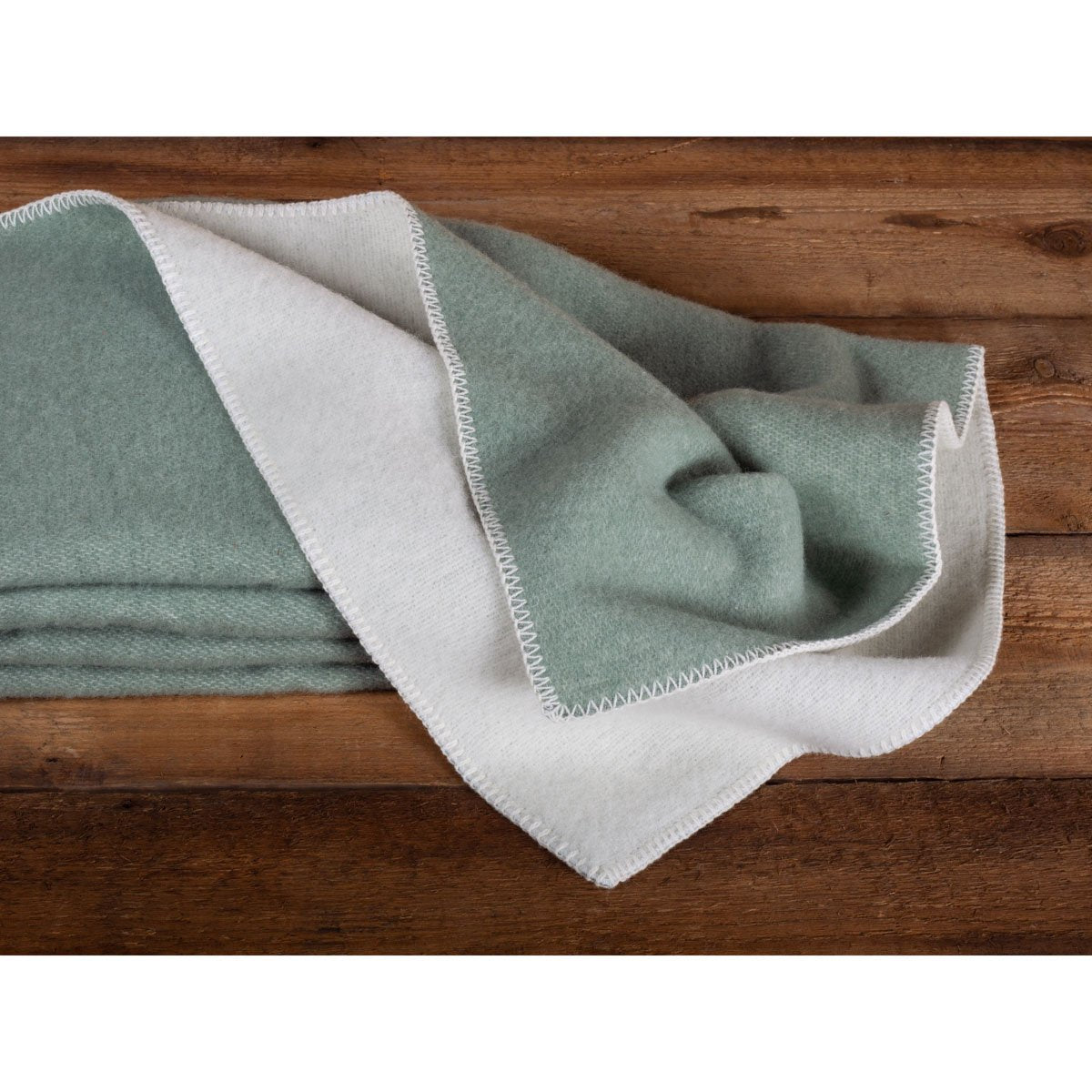 Close-up of Woolen Bed Blanket Cool Mint's woven texture
