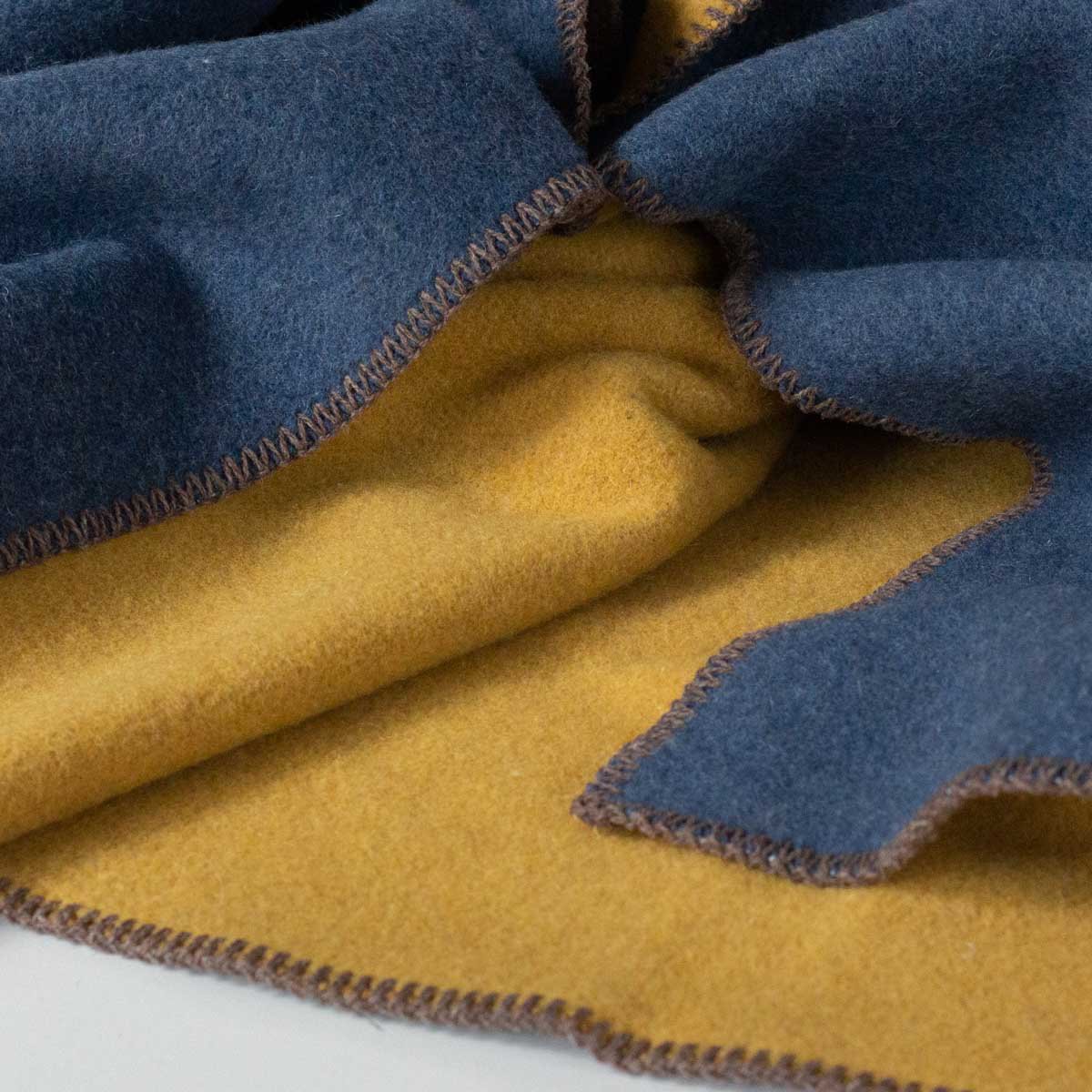 Close-up of Aegean bedspread's merino wool and nylon blend texture