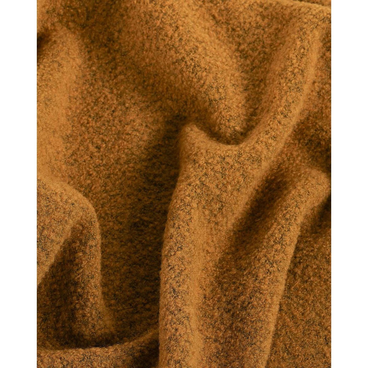 Detail shot of the Paris throw's fringe and edge finish