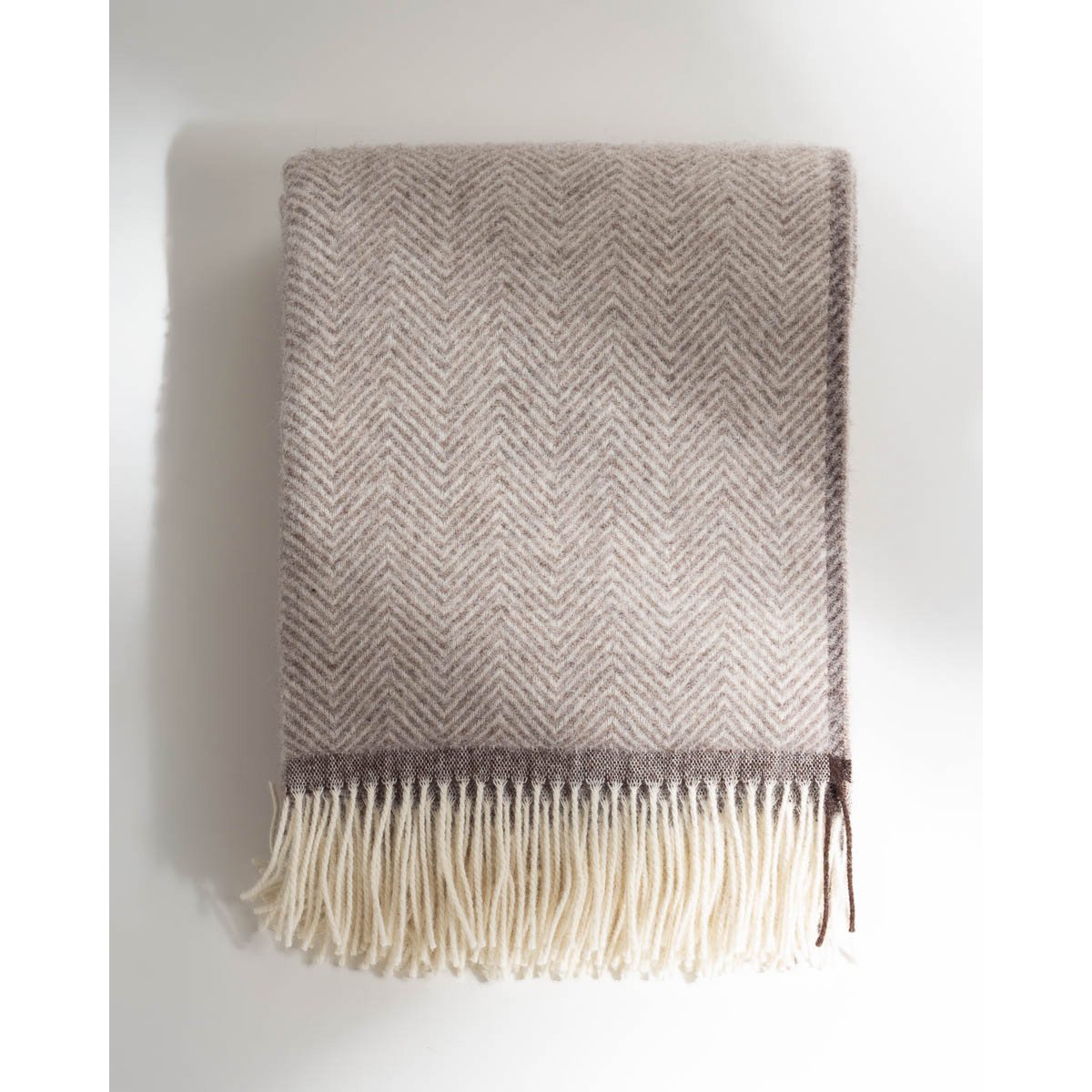 Fabric swatch of the Denver throw in beige