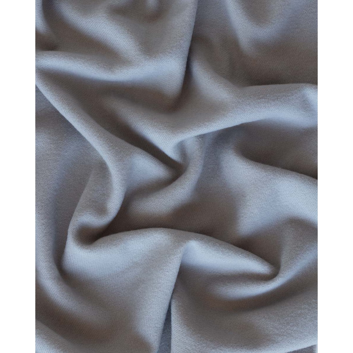 Close-up of the Rio throw's soft grey wool